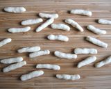 A picture of step 2 of Muscovado Coated Fried Biscuits.