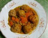 A picture of step 18 of Meatballs with Peas and Carrots in a Pressure Cooker.
