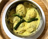 A picture of step 3 of Dim Bhapa (Steamed Egg Curry) Bengali lunch.