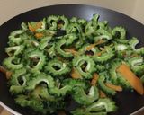 A picture of step 2 of Fried KARELA(Bitter melon).