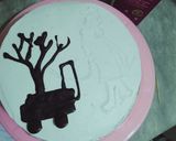 A picture of step 7 of Vanilla cream cake with chocolate chips inside.