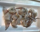 Foto langkah ke 1 dari resep Tumis Mentimun Cumi rasa Miso.