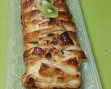 Foto del paso 5 de la receta: Una trenza de hojaldre rellena de kiwi, nueces y pasas
