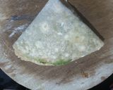 A picture of step 4 of Aloo paratha wrap.