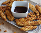 Foto del paso 4 de la receta: Fingers de pollo al horno con kikos y cacahuetes