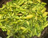 A picture of step 2 of Masala Cluster beans.