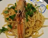 A picture of step 3 of Linguine with Langostines in a tomato and brandy sauce 🎄.
