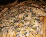 Foto del paso 7 de la receta: Papas fritas con salsa de verdeo