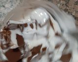 A picture of step 6 of Eggless cake with truffle sauce.