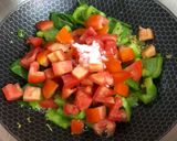 A picture of step 8 of Capsicum Tomato Rice.