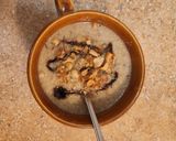 A picture of step 5 of Thyme Cream of Celeriac Soup with Crushed Peanuts.