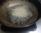 A picture of step 3 of Methi Muthiya (Fried Fenugreek Dumplings).