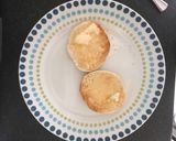 A picture of step 2 of Scrambled egg and avocado on English muffin.