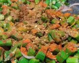A picture of step 3 of Achari Bhindi Fry.