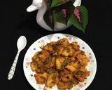 A picture of step 8 of Chatpata Bread Upma in red sauce.