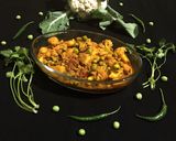 A picture of step 8 of Aloo Gobi Matar.