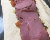 Foto del paso 7 de la receta: Empanada arrollada de pastrón y quesos 🥓🫑🧀🧅
