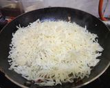 A picture of step 2 of Garlic fried rice.