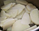 A picture of step 1 of Fried Yam with Egg.