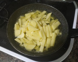 Foto del paso 4 de la receta: Tortilla de espinacas patatas cebolla y ajo