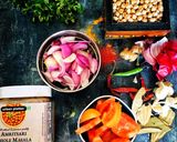 A picture of step 1 of Amritsari chole masala with urban platter’s chole masala ready mix spice.