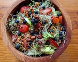 A picture of step 1 of Green Salad with Strawberries, Blueberries, and Savory Granola.