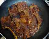 A picture of step 4 of Christmas special Honey pork chops.