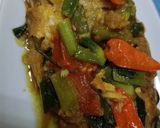 Foto langkah ke 4 dari resep Pesmol Ikan Nila Bumbu Kuning.