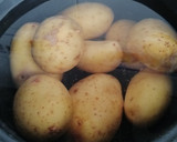 Foto del paso 1 de la receta: Ensalada de patata con naranja