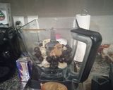 A picture of step 2 of Banana blueberry peanut butter smoothie.
