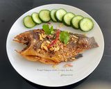 A picture of step 1 of Fried Tilapia With Crispy Garlic.