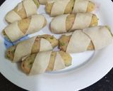 A picture of step 13 of Vegetable Curl Rolls.