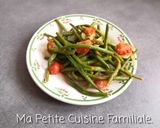 Une image de l'étape 2 de Poêlée de haricots verts et tomates cerises.