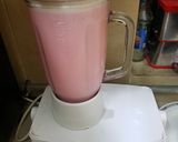 A picture of step 1 of Rooh afza/Ice cream shake.
