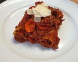 Une image de l'étape 7 de Cannelloni à la bolognaise.