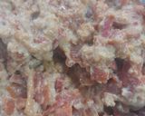 A picture of step 4 of Gajar ka halwa with peels.