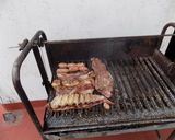 Foto del paso 7 de la receta: Asado, pechito y bondiola de cerdo a la parrilla saborizados