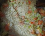 Foto del paso 3 de la receta: Arroz amarillo con salchichas