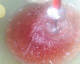 A picture of step 3 of Rooh afza drink with chia seeds.