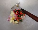 Foto langkah ke 5 dari resep Tumis bunga pepaya.