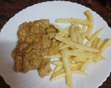 Foto del paso 13 de la receta: Palomitas de cerdo adobado en salsa de almendras y papas fritas