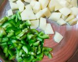 A picture of step 1 of Potatoes And capsicum veg.