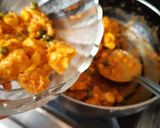 A picture of step 13 of Schezwan matar paneer corn masala.