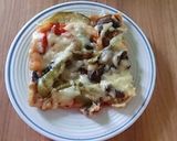 Foto del paso 7 de la receta: Pizza-costra de carne molida de pollo con vegetales (Horno eléctrico)