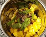 A picture of step 1 of Aam Panna with Mint Twist.