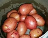 A picture of step 5 of Smashed Vinegar & Salt Crispy Potatoes.