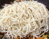 A picture of step 15 of Schezwan Egg Sausage Noodles.