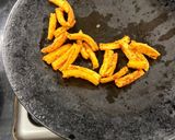 A picture of step 2 of Honey glazed baby corn.