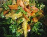 A picture of step 5 of Palak chicken with boiled rice.