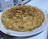 Foto del paso 12 de la receta: Tortilla de patata con queso y cebolla